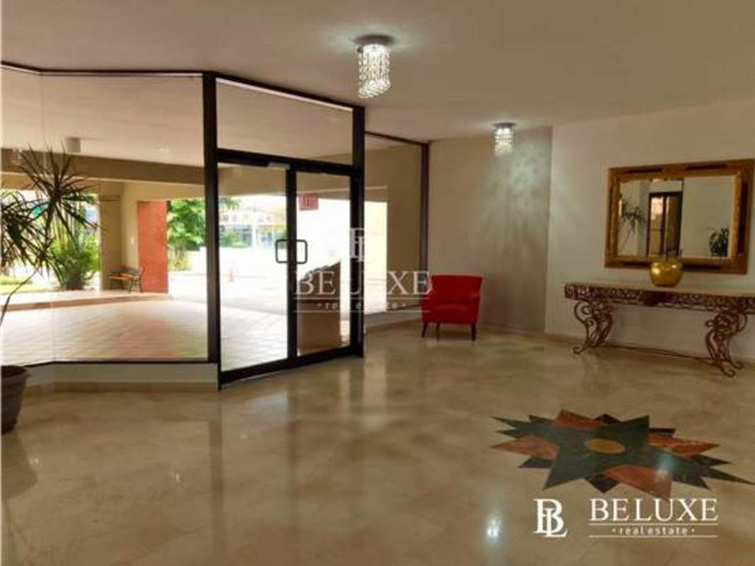 Lobby elegant marble glass doors luxury condo PH Arrecife Punta Paitilla for sale Panama