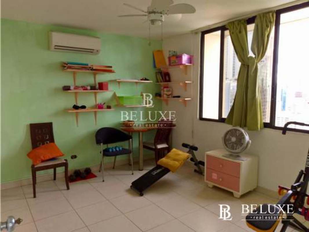 Multipurpose space with gym and office window city view PH Arrecife Paitilla Panama apartment sale