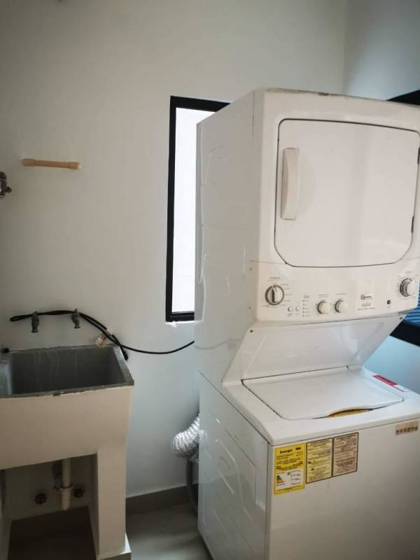 Rooftop pool area overlooking Panama City skyline at PH Canvas Towers Parque Lefevre