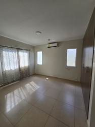 Modern bathroom with glass shower enclosure vanity and tile PH Senderos Costa Verde Panama