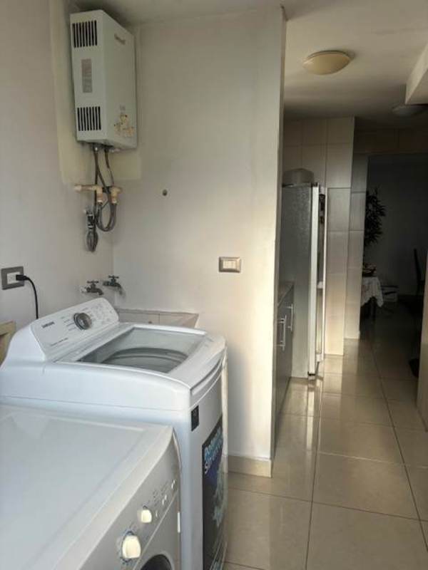 Laundry room with washer dryer and heater PH Rokas Condado del Rey