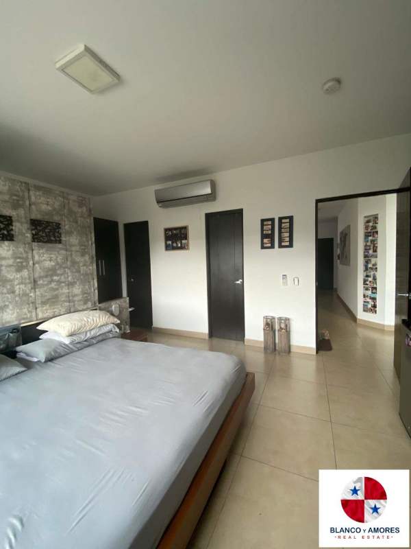 Modern double sink bathroom with large mirror and tile work Dorado Village Panama