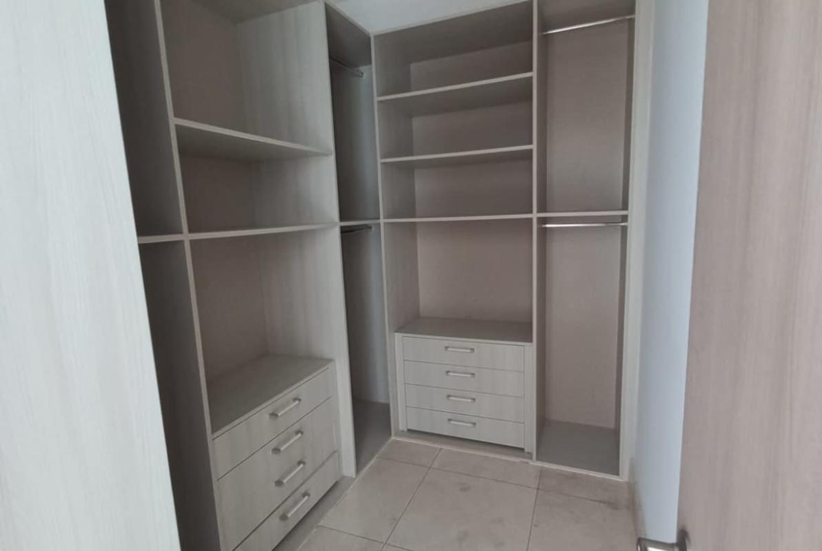 Contemporary lobby with marble floors and chandelier PH Deluxe Residences Punta Paitilla Panama
