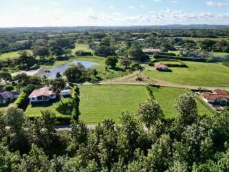 Aerial countryside land near Pedasí overlooking trees fields close to Playa Venao and Isla Iguana