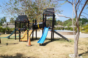 Contemporary kitchen with granite countertops and full appliances in Coronado Golf condo Playa Coronado