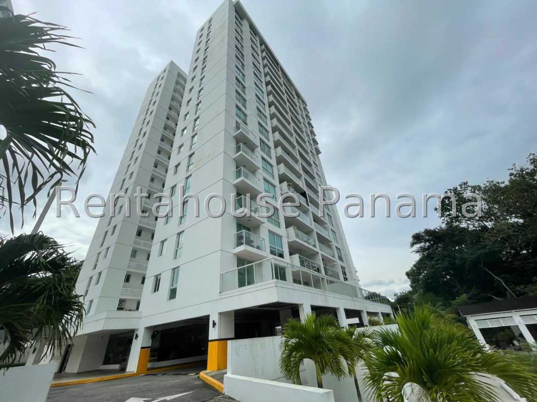Outdoor swimming pool, play area, and gardens in Clayton Residences Panama City