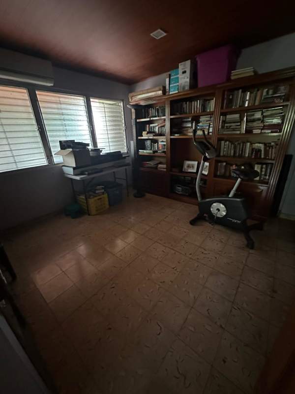 Large living and meeting space with tiled floor and wooden ceiling commercial house Betania