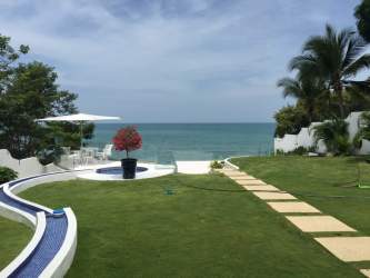 Beautiful gardens surrounding beachfront villa estate Costa Esmeralda luxury property Panama