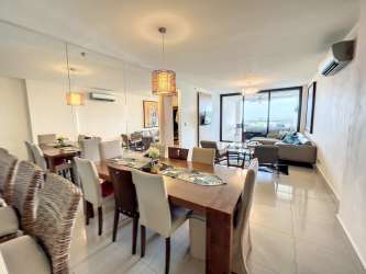 Spacious master suite with large window ocean views in PH CasaMar beach apartment San Carlos Panama
