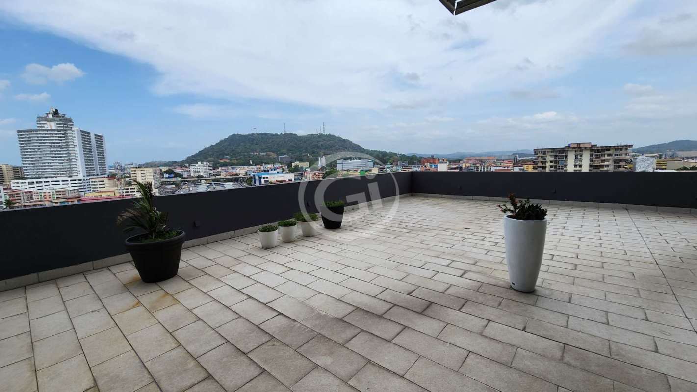 Outdoor rooftop terrace of PH BOC with mountain and skyline views in Panama City