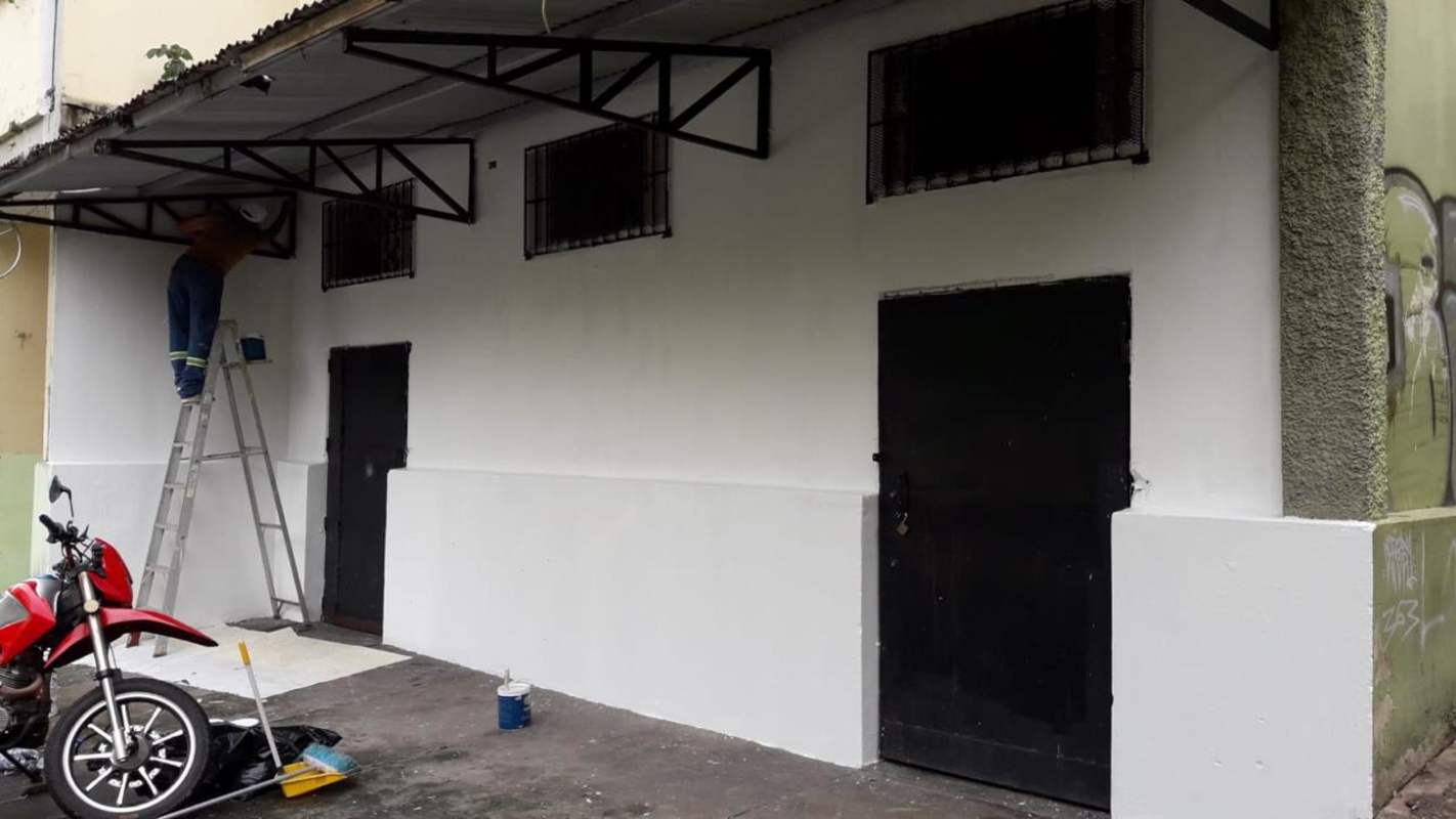 Covered entryway with solid black doors and barred windows under metal canopy in PH Tuira Panama