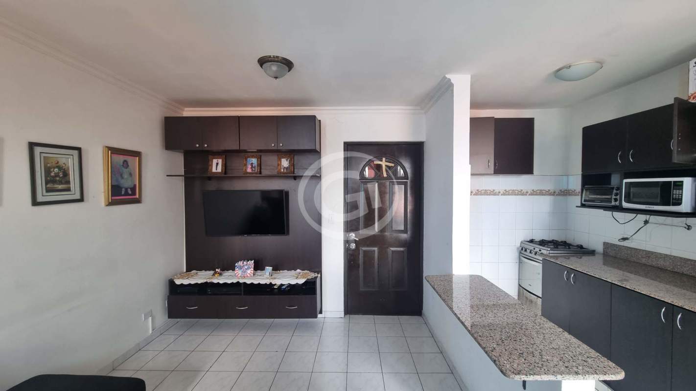 Children's bedroom with bunk beds, colorful decor, built-in closets in Panama city apartment