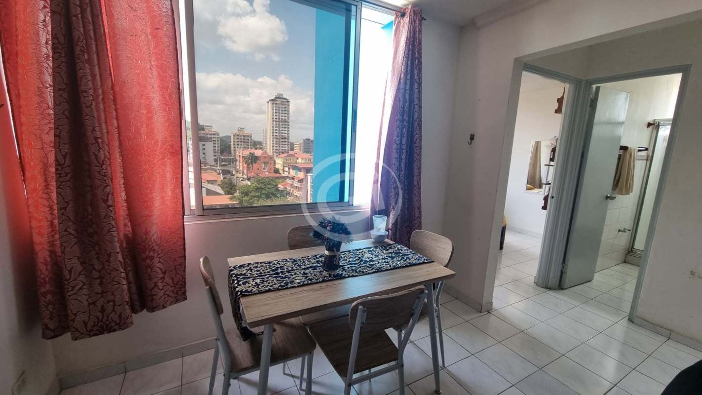 Bathroom with enclosed glass shower, vanity mirror cabinet in Panama apartment