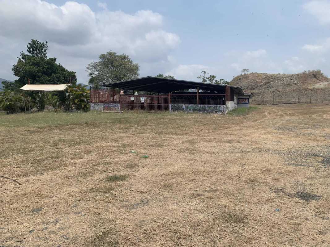 Rustic utility and livestock enclosures with tin-roofed shelters and fenced arena on commercial land Chepo Panama
