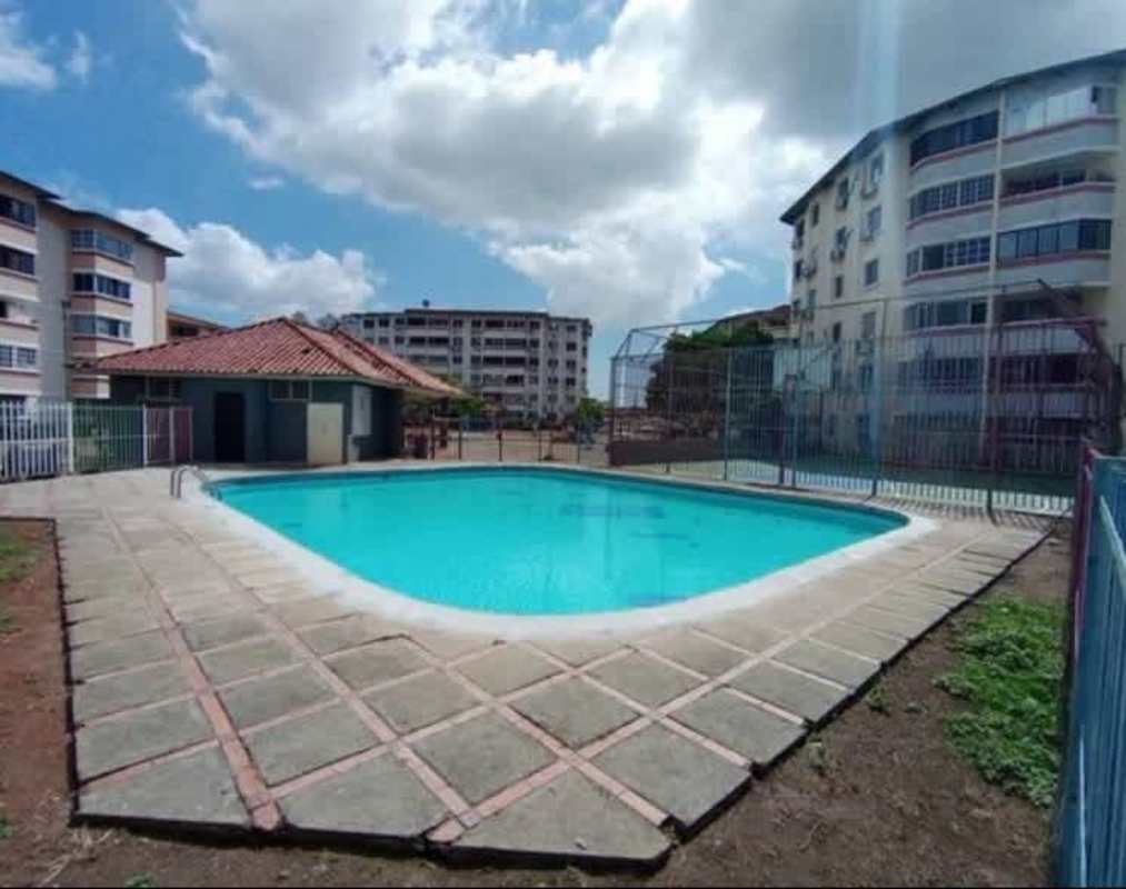 Apartment complex swimming pool with sun deck at Residencial Parque del Este Campo Limberg Panama City