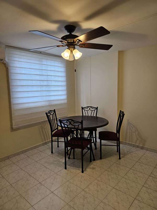 Playground and residential buildings inside gated Residencial Parque del Este Panama City