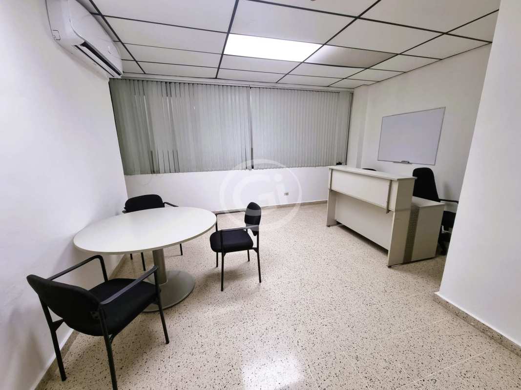 Interior view furnished modern minimalist office space with meeting table blinds and AC in PH BICSA Tower Panama