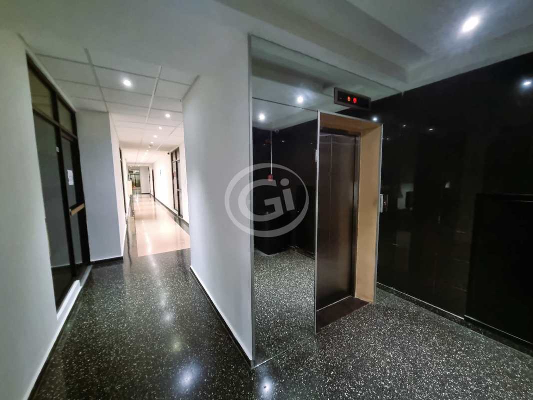 Furnished office interior with large windows air conditioning blinds white walls at PH BICSA Tower Panama