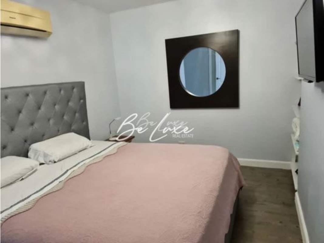 Spacious living room with panoramic windows in PH Pacific Sun Punta Pacifica