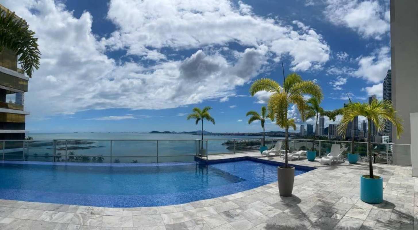 Sleek modern kitchen with stone countertop and built-in appliances in PH BICSA Tower Panama