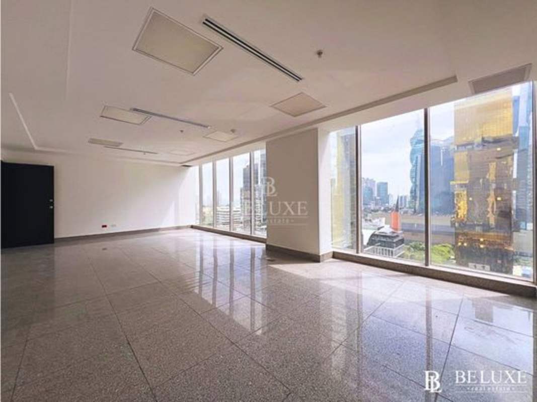 Open office with large windows and city views in Panama financial district