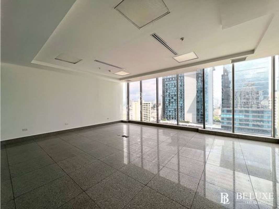 Wide hallway with glass doors and modern tiles in Obarrio SFC Tower