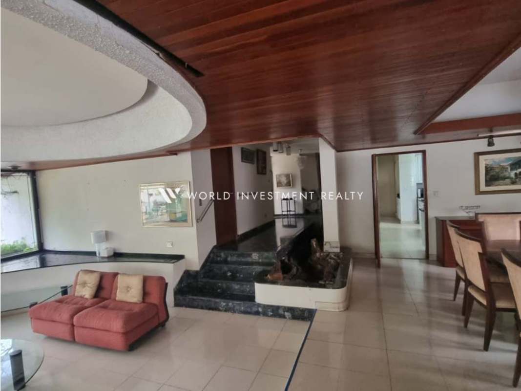 Covered terrace with wooden ceiling and views of private garden and swimming pool Bella Vista Panama