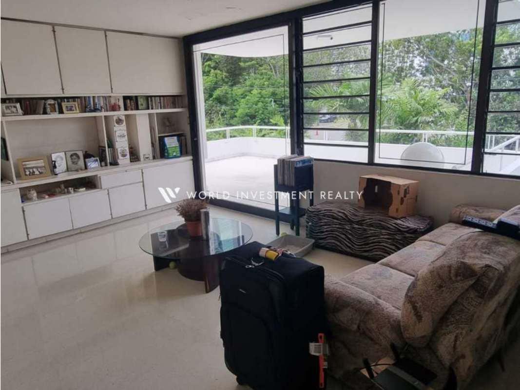 Spacious kitchen with granite countertops, island, modern appliances in Bella Vista house for sale