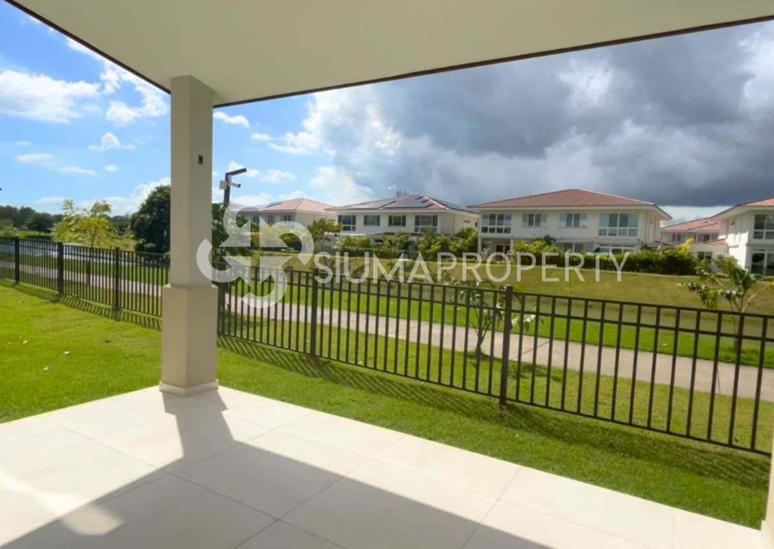 Covered terrace overlooking large lawn and garden, exclusive Santa María Golf & Country Club Panama