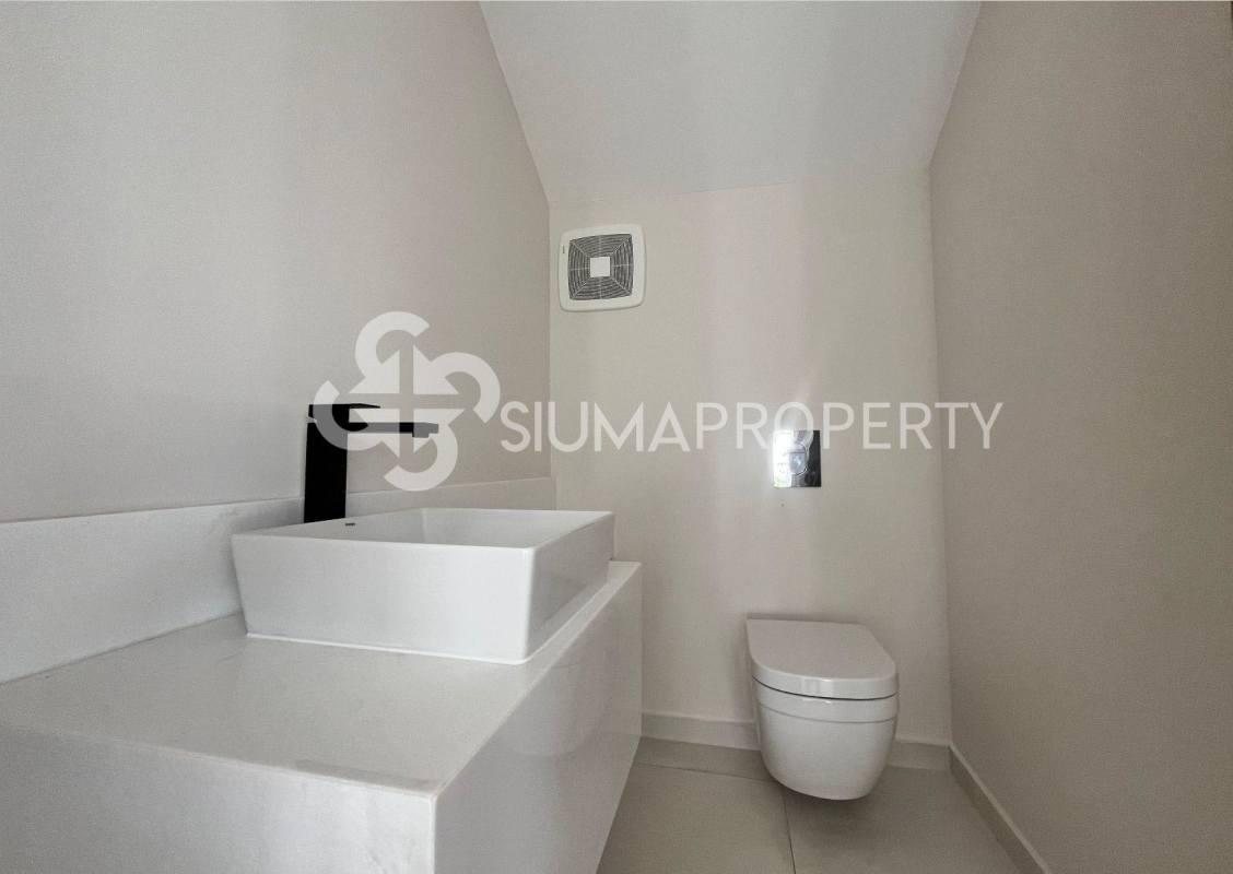 Contemporary bathroom with wall-mounted fixtures in exclusive Santa María golf villa Panama