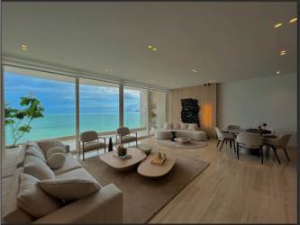 Panoramic infinity pool area with ocean views at The Towers Punta Paitilla luxury building in Panama City