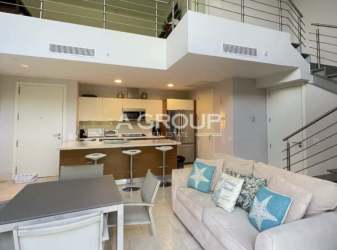 Loft apartment balcony pool and garden views Puntarena Buenaventura Panama Real Estate