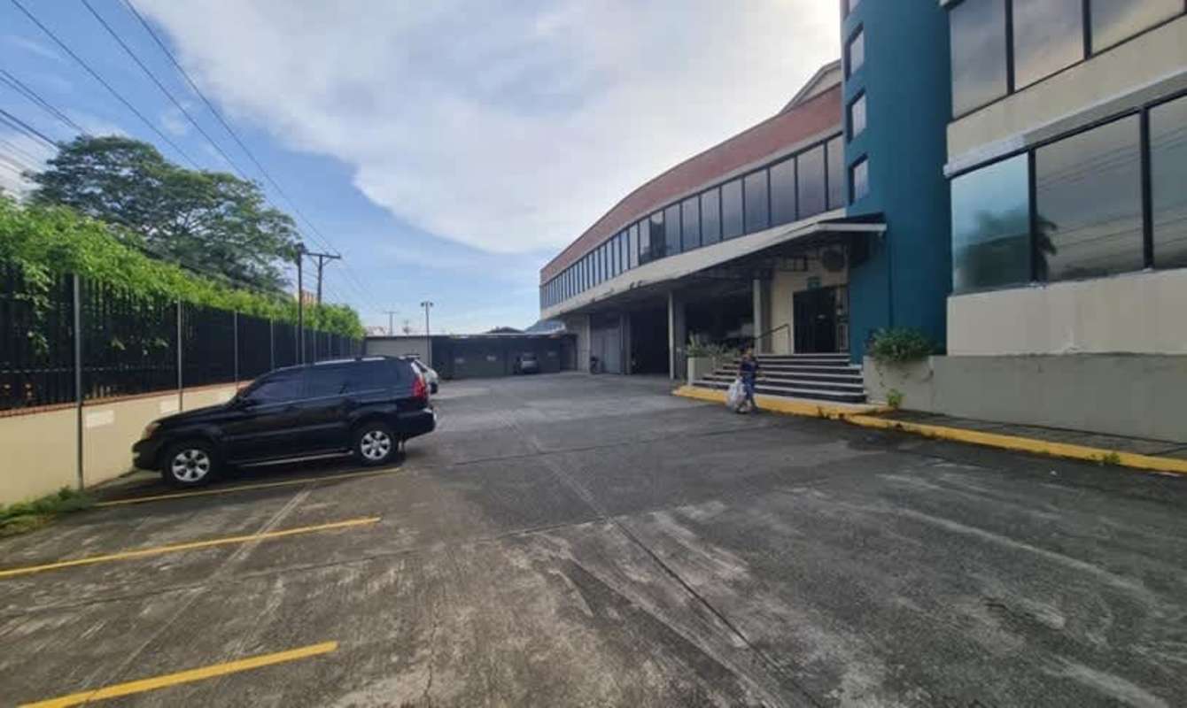 Aerial image commercial property with extensive parking lots and warehouse Curundu Panama