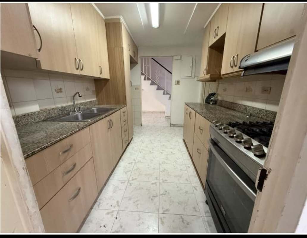 Marble stairs with black wrought iron railing in Betania Club X residence Panama