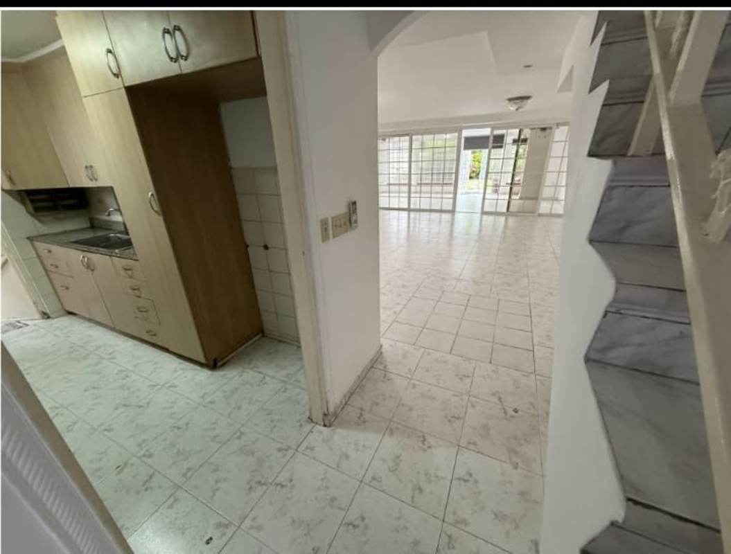 Spacious living and dining room with large sliding glass doors to the garden Betania Panama