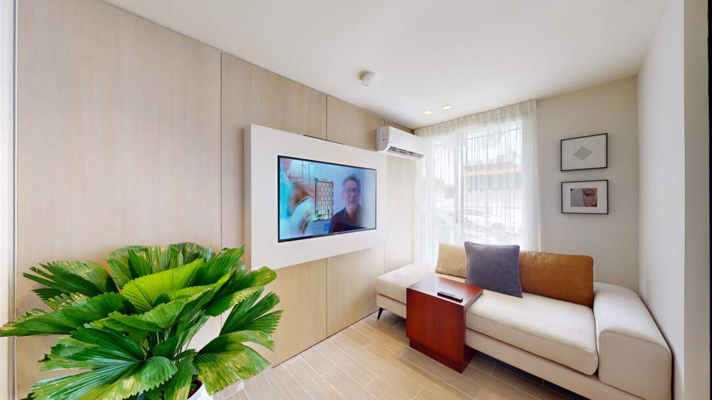 Luxury rooftop infinity pool on terrace overlooking skyline at PH Armonia Panama