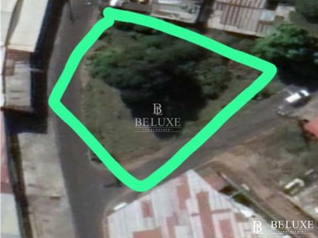 Large vacant lot corner with existing tree coverage suitable for development in Rio Abajo Panama