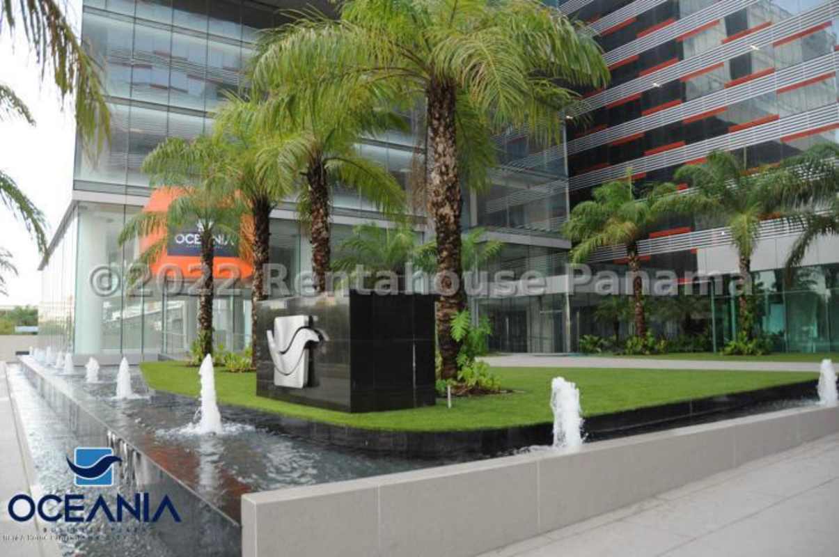Elegant office lobby with reflective columns and polished floors in Oceania Plaza