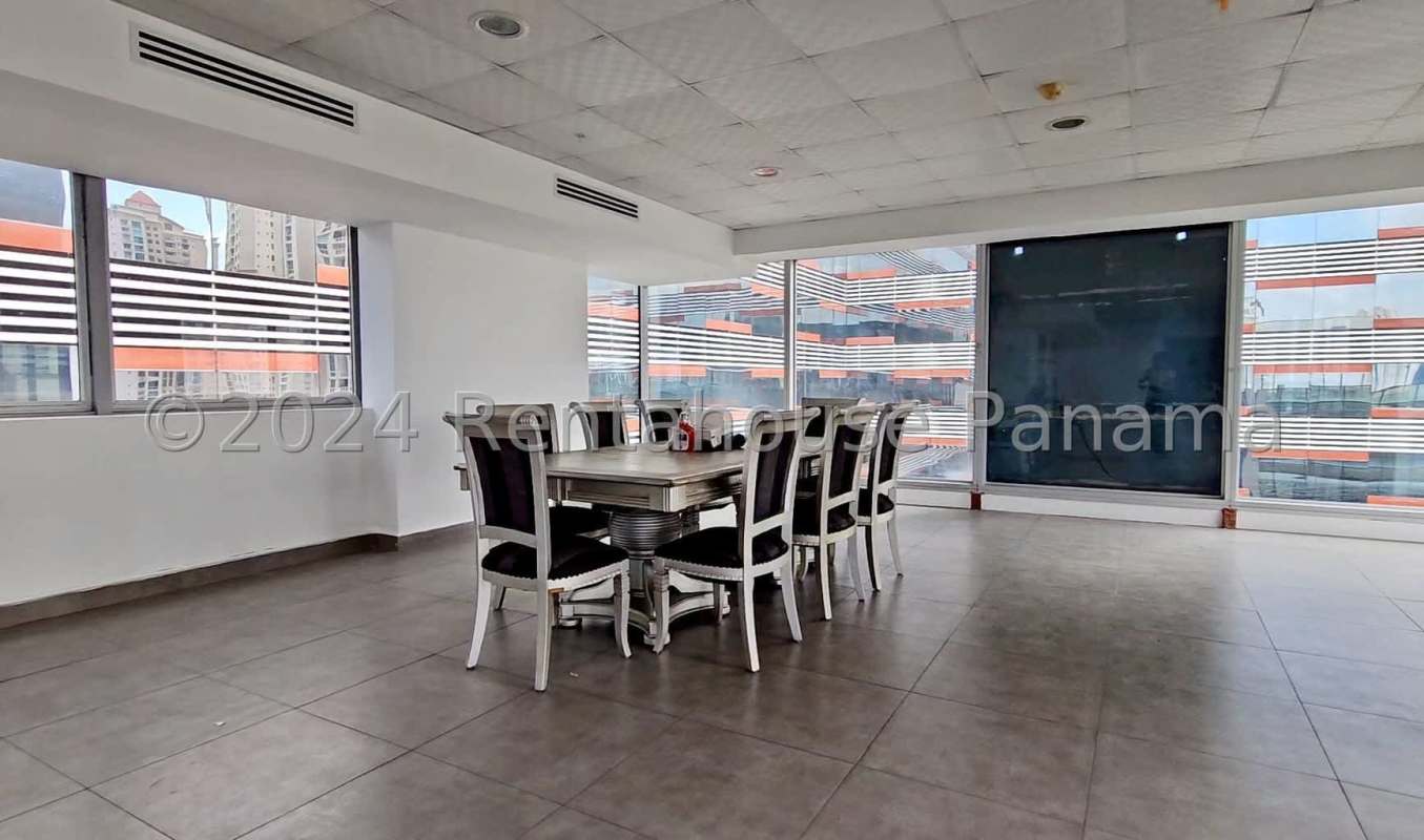 Modern elevator hall with marble finishes and multiple lifts
