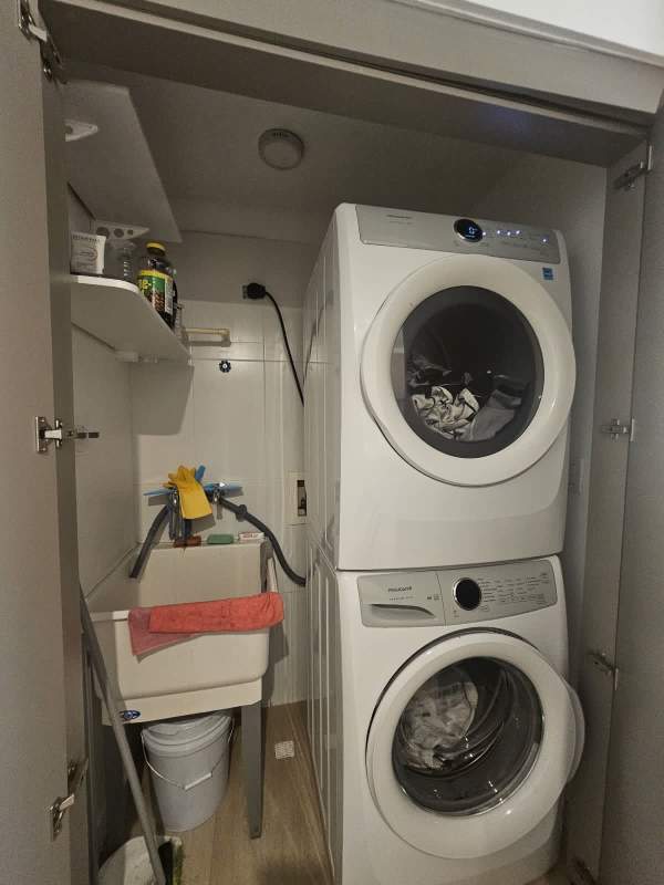 Bathroom with glass enclosed shower sink mirror PH Quatrium Panama City rental