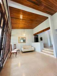 Covered outdoor terrace overlooking garden in Villa Dora David Chiriquí Panama