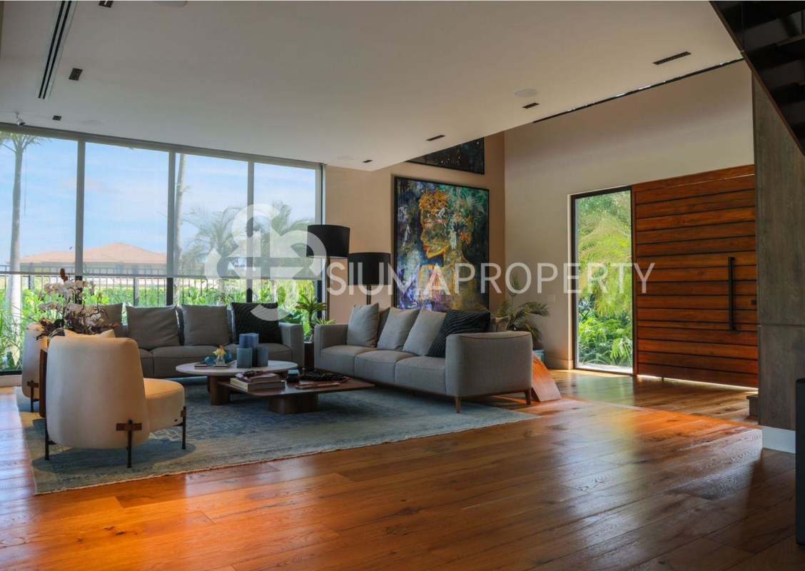 Spacious dining room with floor-to-ceiling windows overlooking garden in luxury mansion Santa Maria Panama