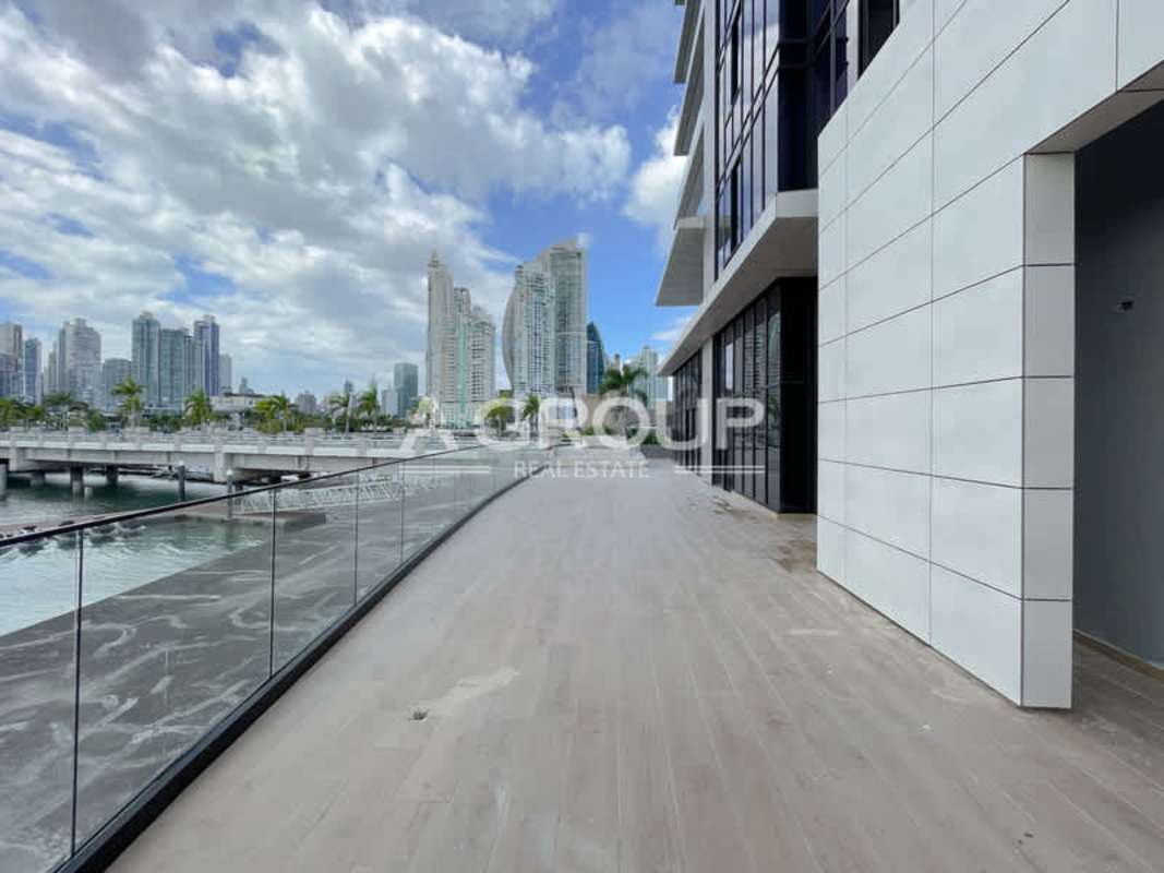 Modern balcony with glass railing overlooking ocean marina Panama City