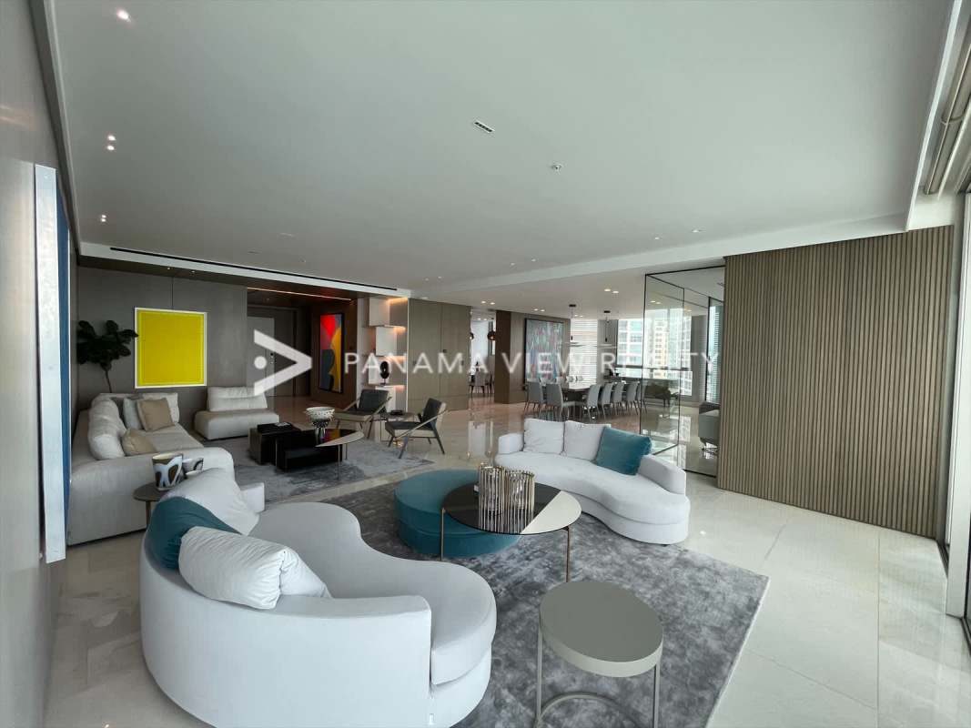 Family lounge area with modern decor and panoramic Pacific Ocean views Punta Pacifica