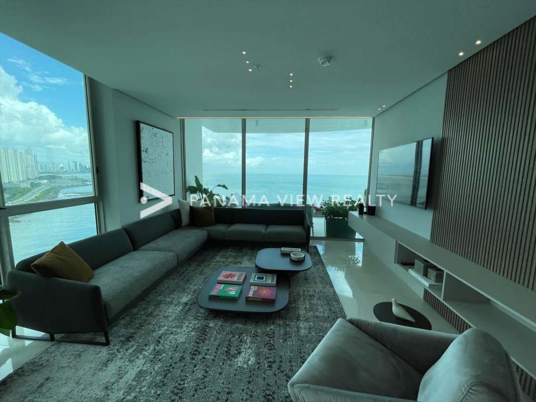 Contemporary kitchen with island marble counter top high-end appliances at Pacific Point Panama