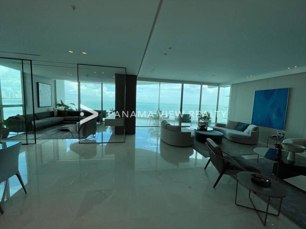 Master bedroom with large windows ocean views and luxury finishes at Pacific Point Punta Pacifica