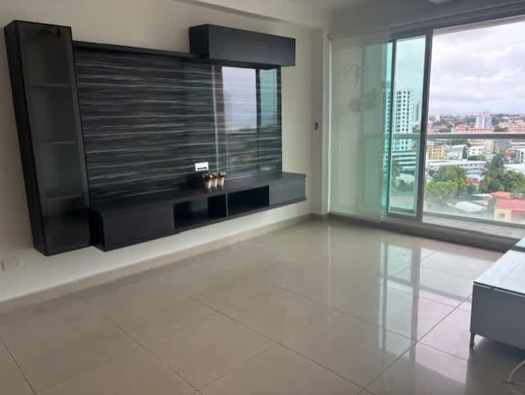 Modern kitchen with white cabinetry, granite counter, and appliance set in PH Mirador del Golf Panama