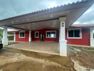 Bright unfurnished living room mountain landscape view through sliding doors in Las Lajas Panama