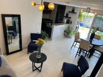 Bedroom with air conditioning, tiled floor, window and closet at Playa Dorada Veracruz Panama