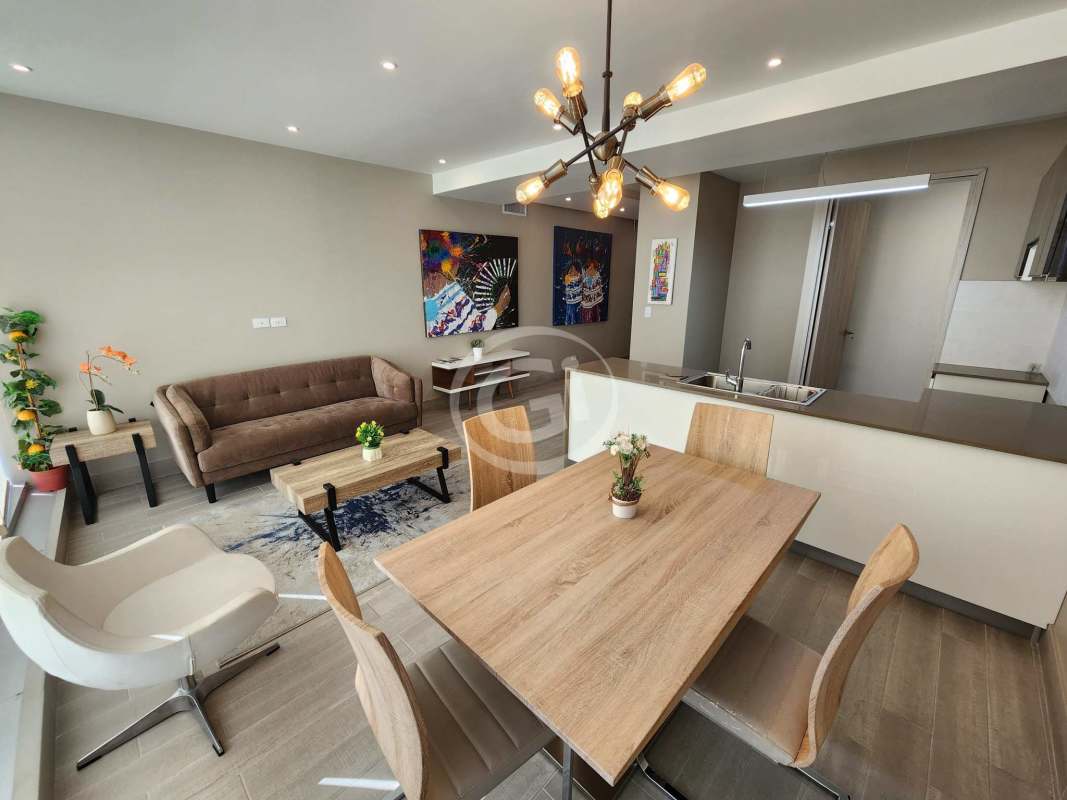 Modern kitchen with breakfast island, stylish lighting, open plan in Azzurre 42 Bella Vista Panama